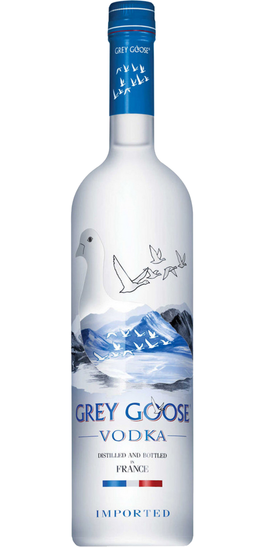Grey Goose Vodka 375ml bottle from France, displayed on a sleek, reflective surface. The bottle is tall and slender with a frosted glass finish and features the distinctive Grey Goose logo in bold, emphasizing its premium quality and French origin