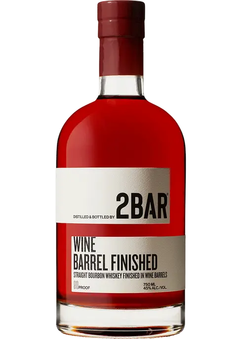 750ml bottle of 2BAR Bourbon Straight, Wine Barrel Finished from Washington, displaying its rich amber color in a clear glass bottle, highlighted by a label that emphasizes its unique wine cask maturation and artisanal origins