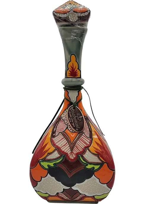 Dulce Amargura Tequila Extra Aged Añejo Collectible Edition 1L, showcasing an ornate, hand-painted bottle with intricate designs, filled with rich amber-colored tequila