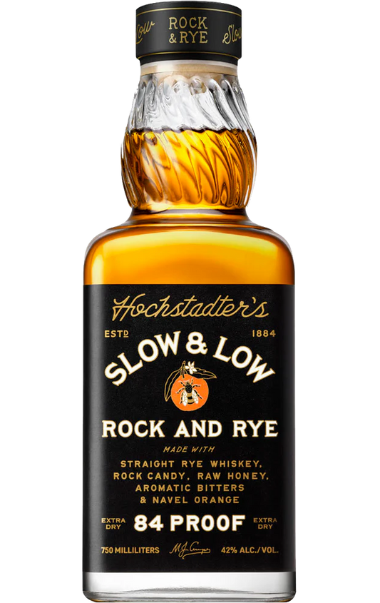 750ml bottle of Slow and Low Whisky Rock & Rye, featuring a vintage-style label and a clear view of the amber-colored whisky inside.